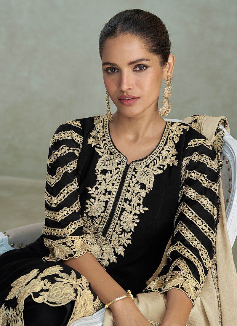 Gold thread embroidery detail on black georgette salwar suit