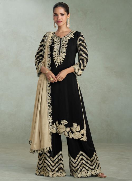 Black and gold embroidered georgette salwar suit with wide‑leg pants and beige dupatta