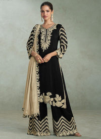 Black and gold embroidered georgette salwar suit with wide‑leg pants and beige dupatta