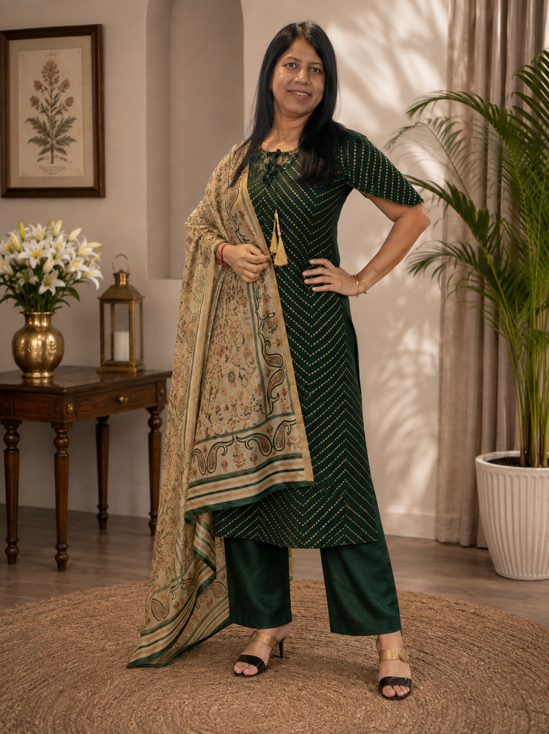 Dark green salwar suit with embroidered yoke and gold detailing