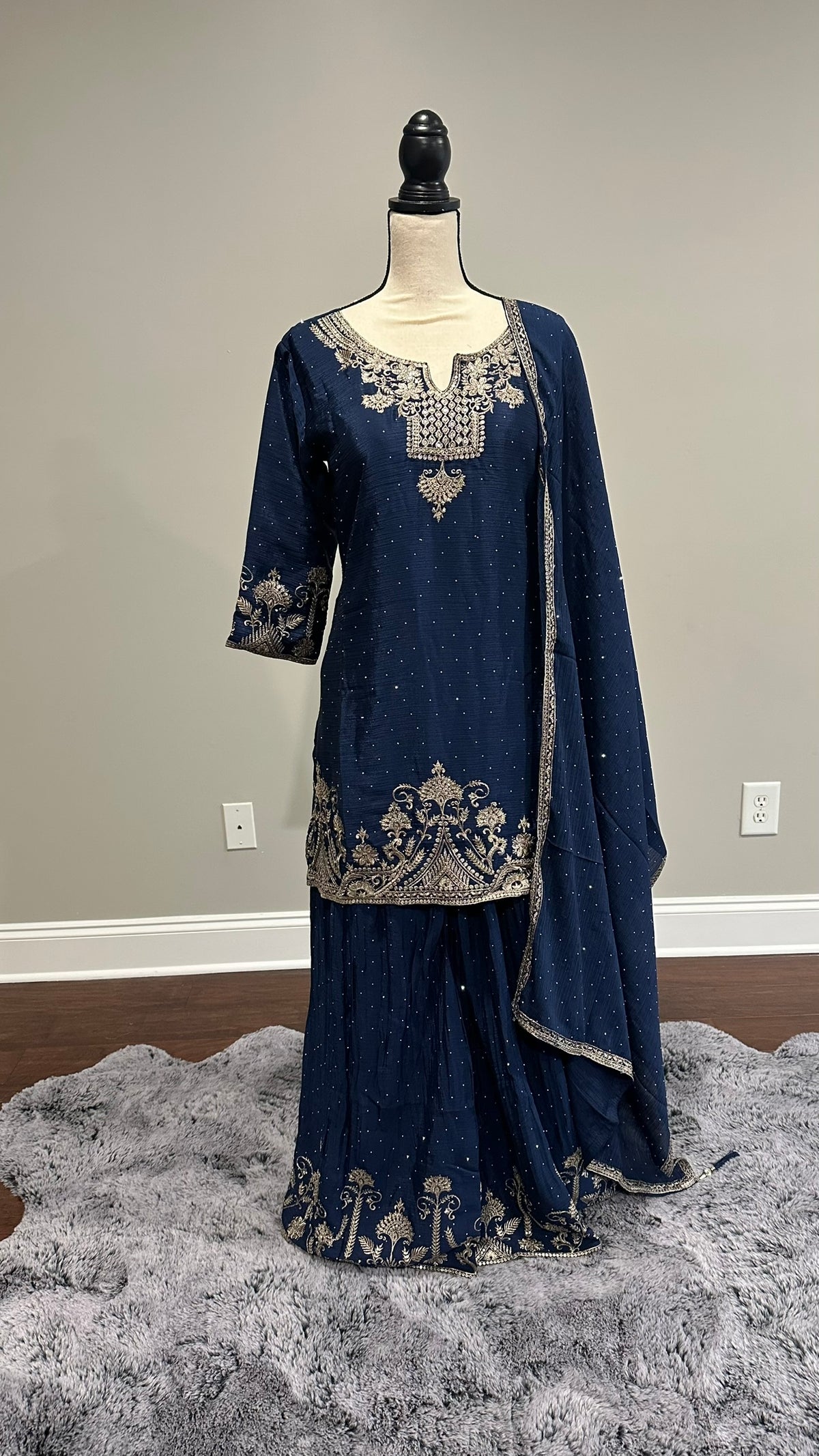 Model wearing navy blue silk sharara suit with silver embroidered kurta, wide-flared pants and matching dupatta – Spark In Style
