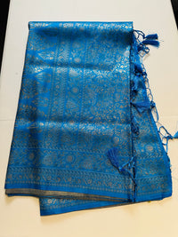 Blue silk saree with silver woven floral motifs and tassel pallu